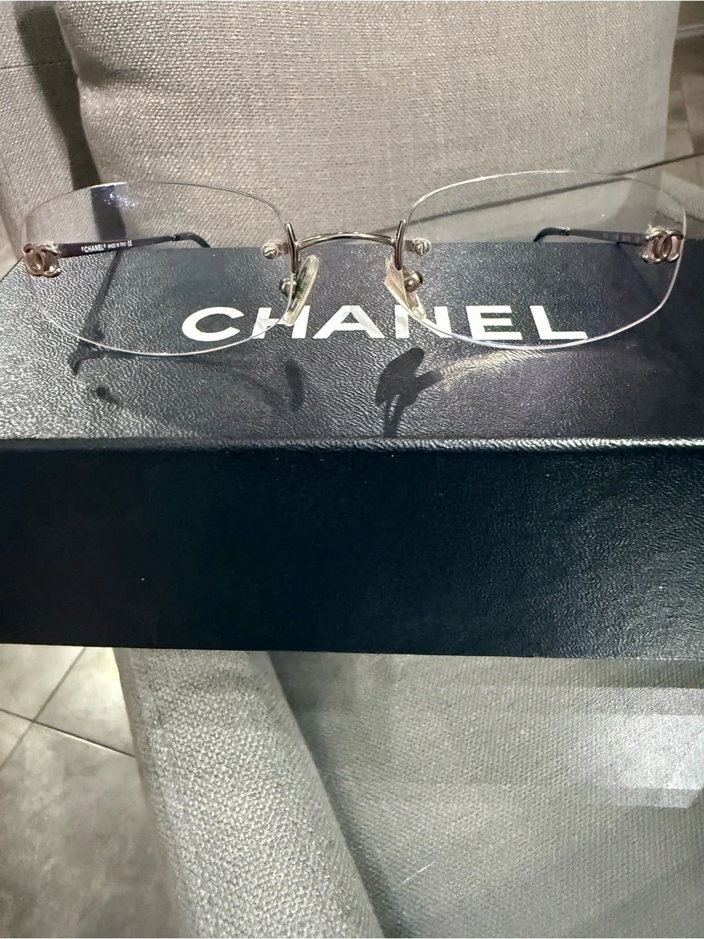CHANEL Rimless Women's Glasses with bronze Accents